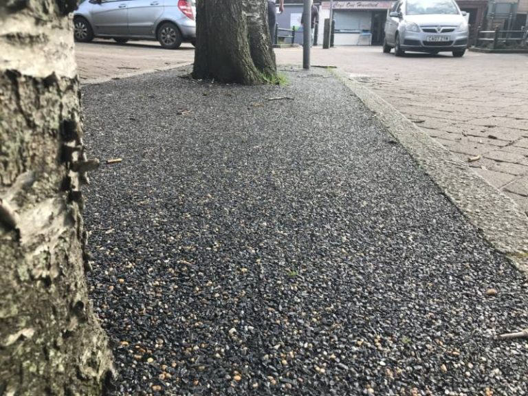 Permeable resin bound