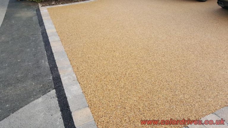 Water permeable resin bound gravel